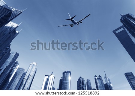 Shanghai city\'s buildings, commercial aircraft,