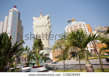 MACAU, CHINA - NOVEMBER 2, 2012: Bank of China, Grand Lisboa Casino and Lisboa Casino in the modern part the city. Macau is the gambling capital of Asia and is visited by about 29 million people year.