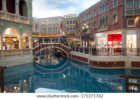 MACAU, CHINA - NOVEMBER 2, 2012: The Venetian - very famous entertainment complex includes the largest shopping mall, luxurious hotels and the largest casino in the world. Evening time.