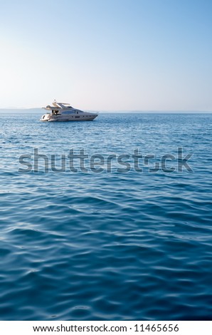 The yacht costs on an anchor in the sea.Summer.Evening