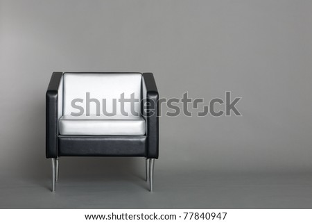Lounge chair with a gray background. Modern design.