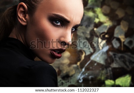 Beautiful woman dramatic portrait. Vogue style photo.