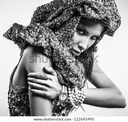 Luxury & beauty woman in a fashionable clothes. Black-white studio fashion photo.