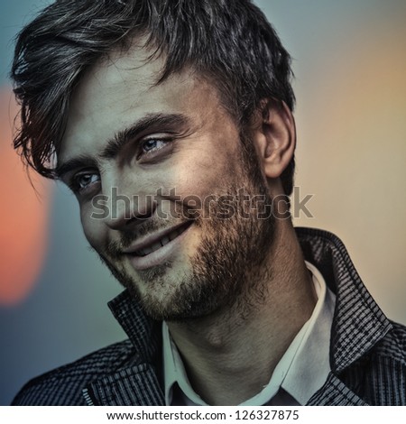 Elegant young handsome man..Multicolored digital painted image portrait of men face.
