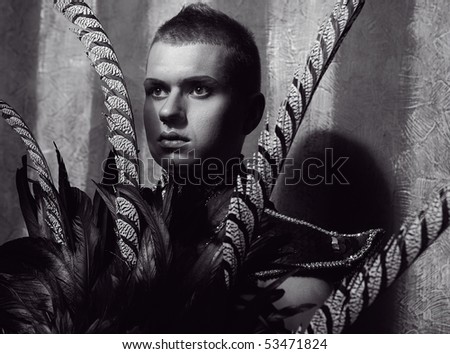 Expressive Portrait of attractive man with concentrated and gloomy face. Black&White photo.