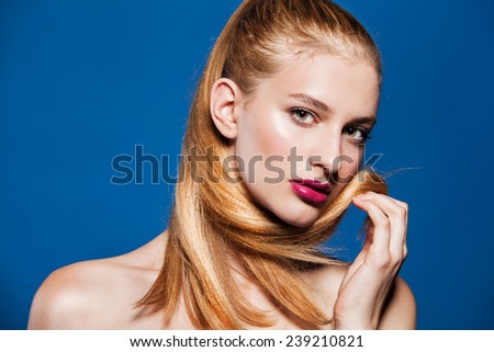 Beauty portrait of beautiful woman with ponytail