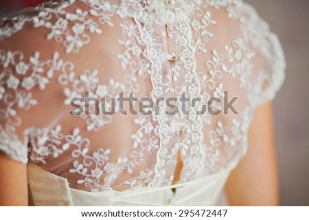 Close up of lace back of wedding dress