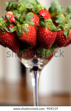 red strawberries in a martini glass