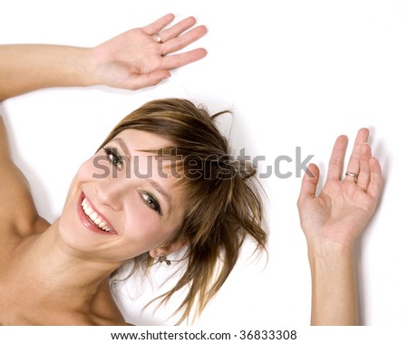 pretty young brunette woman posing on white background