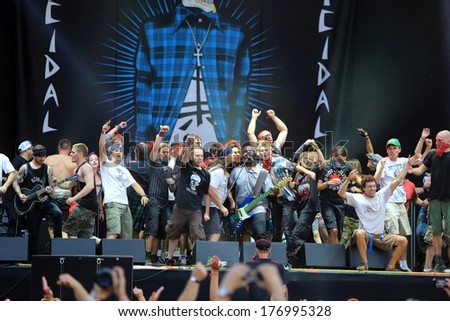 JAROCIN, POLAND - JULY 20: Suicidal Tendencies at live concert. The audience came on stage and sing along with the band. Rock Festival Jarocin 2013, Poland
