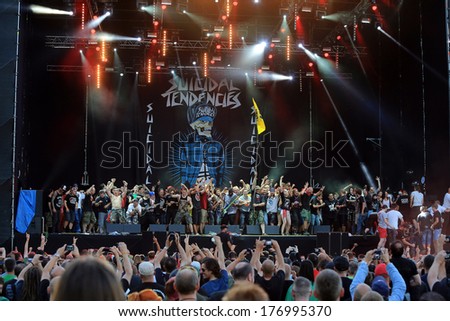 JAROCIN, POLAND - JULY 20: Suicidal Tendencies at live concert. The audience came on stage and sing along with the band. Rock Festival Jarocin 2013, Poland.