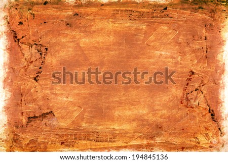 Cardboard surface structure with scratches, brown colored background texture