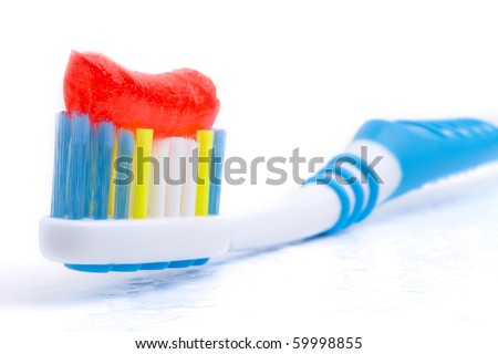 Close-Up Colorful Toothbrush Toothpaste With Red On A White Background ...