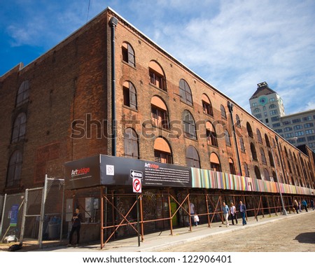 BROOKLYN, NY - SEPT 16:  Historic Empire Stores building with Chromatweet Artbridge installation in DUMBO Brooklyn on Sept 16, 2012. MacasevÃ¢Â?Â?s ChromaTweet was part of  the Dumbo Arts Festival in 2011.