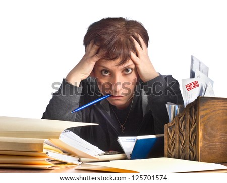 Stressed woman working on taxes and household finances