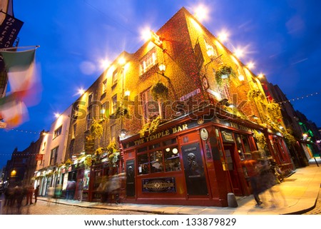 DUBLIN, IRELAND - APR 1: Night street scene in the Dublin, Ireland Temple Bar historic district on April 1 2013. This landmark medieval area is known as Dublins cultural quarter with lively nightlife.