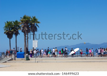 VENICE BEACH, CA - AUG 14:  View at Venice Beach in Los Angeles CA on Aug 14, 2012.  Venice is one of LA\'s most popular beaches attracting surfers, skateboards, bohemians, musicians and tourists.