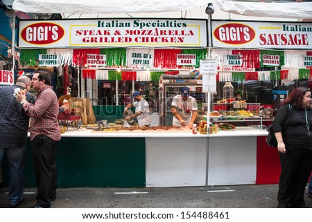 NEW YORK CITY - SEPT 13: Food vendor at  87th Feast of San Gennaro in NYC on Sept 13 2013. The feast celebrates Italian heritage and the Patron Saint of Naples on the streets of Little Italy each year