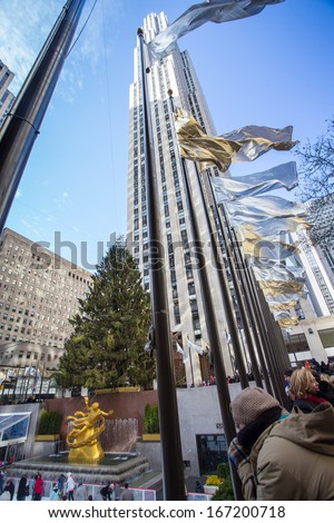 NEW YORK CITY - DEC 13: View Rockefeller Center in NYC on Dec 13, 2013. Declared a National Historic Landmark Rockefeller Ctr. is home to the iconic NYC Christmas Tree and skating rink.