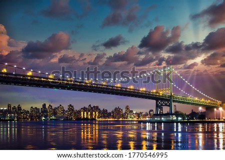 Historic Triborough Bridge from Astoria Queens towards New York City Manhattan after sunset with city lights Stock fotó © 
