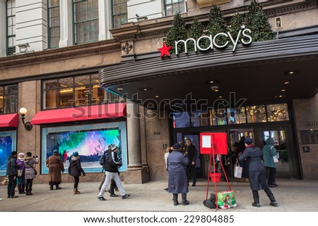 NEW YORK CITY - DECEMBER 12, 2013:  View of Macy\'s Herald Square in midtown Manhattan with Christmas window display.