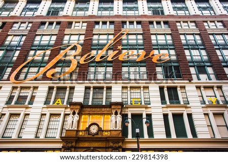 NEW YORK CITY - DECEMBER 12, 2013:  Front facade of Macy\'s with the Believe sign lit for the Thanksgiving and Christmas season.