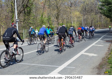 NEW YORK CITY - APRIL  25, 2014:  View of cyclists riding along bike lane in Prospect Park Brooklyn.
