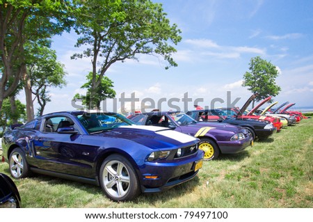 SANDS POINT NY - JUNE 18: Ford Mustangs on display at the 2011 Mustangs on the Beach Auto Show, Saturday June 18th 2011, at Long Island\'s Sands Point Preserve in New York.