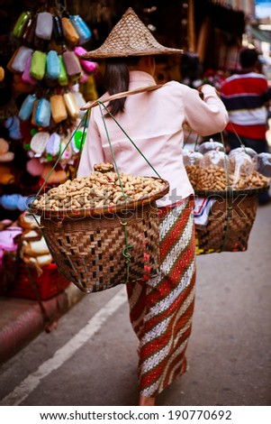 Woman Carrying Peanut Baskets - Golden Triangle, Thailand