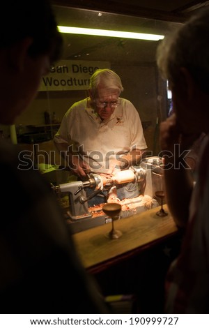 SAN DIEGO - JUL 4: Woodturner displays his skills at the famous San Diego State Fair on July 4, 2012 in San Diego, California, USA