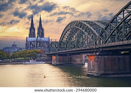 Cologne, Germany. Image of Cologne with Cologne Cathedral and Hohenzollern bridge across the Rhine River.