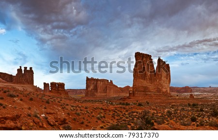 Rocky desert sunrise. Image of rocky desert landscape in Arches national park, Utah, USA.