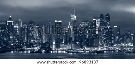 Manhattan, New York City. Panoramic image of Manhattan skyline at night.