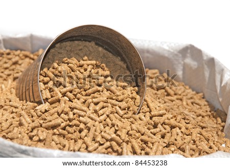 Bag of horse feed with a measuring can