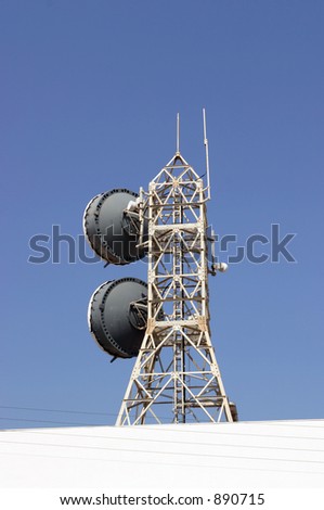 A relay station transmitting radio, telephone signals from satellite.