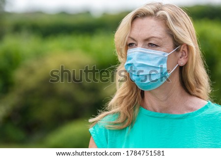 Similar – Image, Stock Photo Blonde woman with mask working on laptop in coffee shop