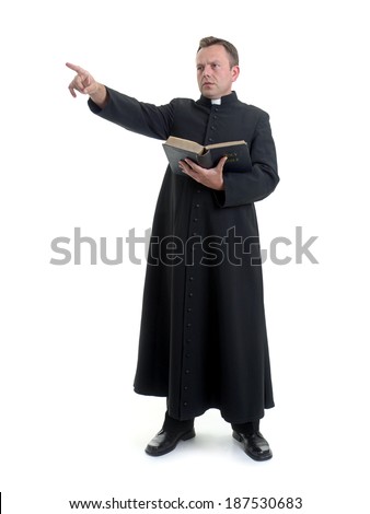 Catholic priest preaching while holding a Bible, against a white background. Stock fotó © 