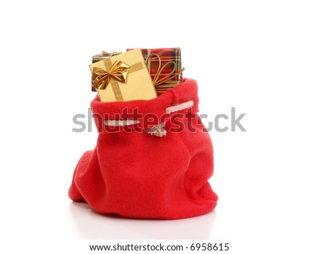 Santa Claus Bag Full Of Christmas Presents Over White Background Stock ...