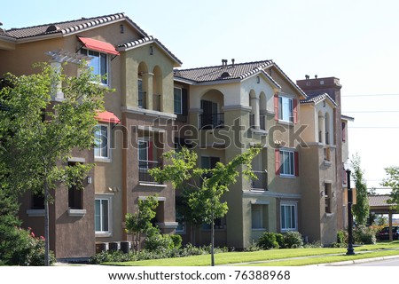 Modern apartment complex in suburban neighborhood