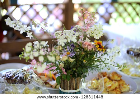 field flower bouquet on festive table