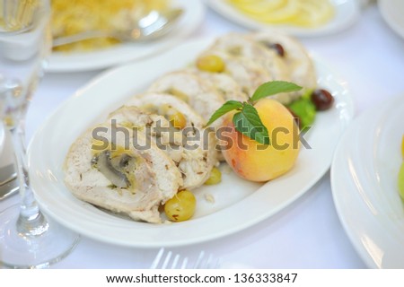meat roll with mushrooms and peach