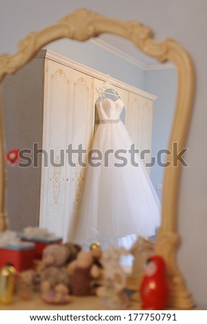wedding dress reflection in mirror