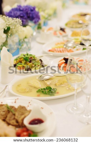 chicken in jelly with spoon on table