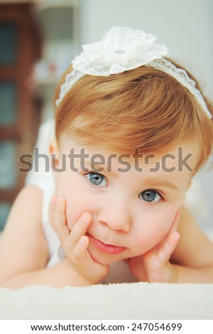 closeup portrait of cute girl with lace bow