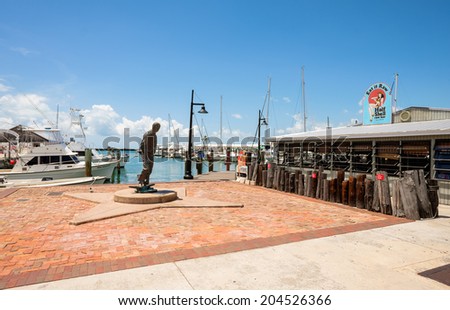 KEY WEST, FLORIDA USA - JUNE 26, 2014: Popular Bight Marina with restaurants and charter boats available for hire in Key West.