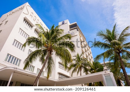 Miami Beach, Florida USA - August 1, 2014: The beautiful Art Deco hotels in Miami Beach are popular international travel destinations with palm trees and art deco architecture.