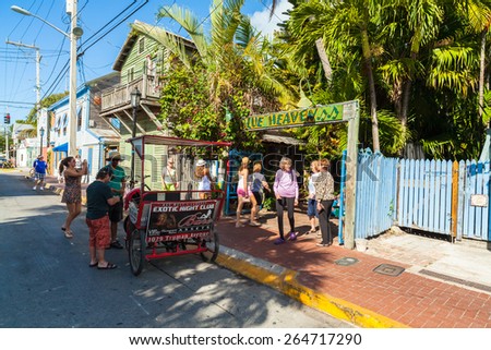 Key West, Florida USA - March 2, 2015: Visitors entering the iconic Blue Heaven restaurant in the historic Bahama Village of Key West.