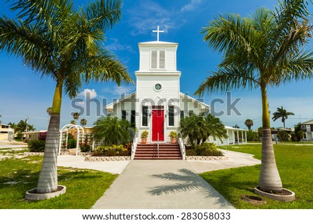 Everglades City, FL USA - May 20, 2015: The Everglades Community Church nestled in the heart of the Florida Everglades is a heritage landmark.