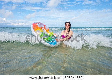 Pretty middle age woman enjoying beautiful Miami Beach.