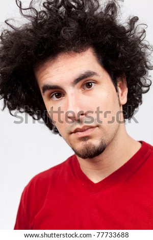 Handsome Young Hispanic Male With Curly Black Hair And Goatee Against A ...